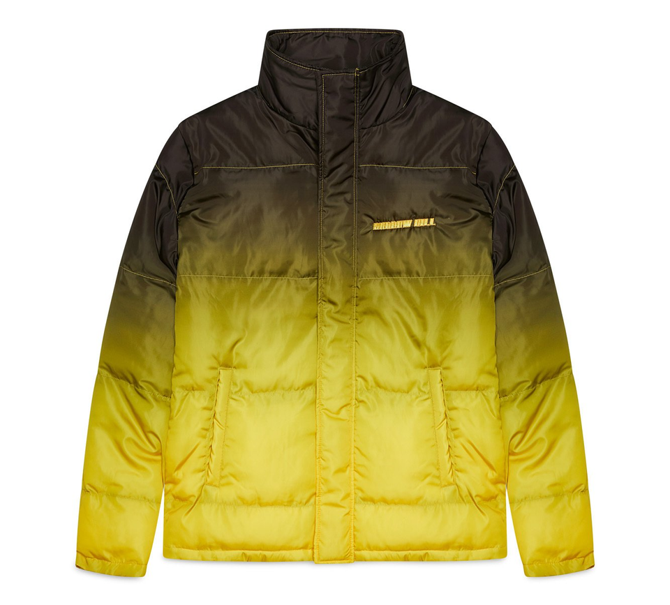Black-to-yellow ombre puffer jacket on a white background